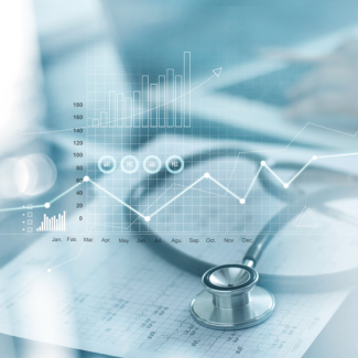 business graphs overlay picture of stethoscope